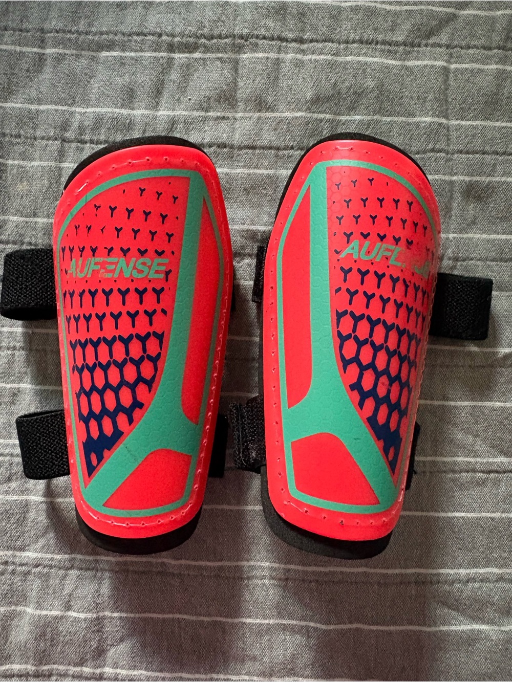 Kids Soccer Shin Guards in Coral and Teal size XS 3-5 years